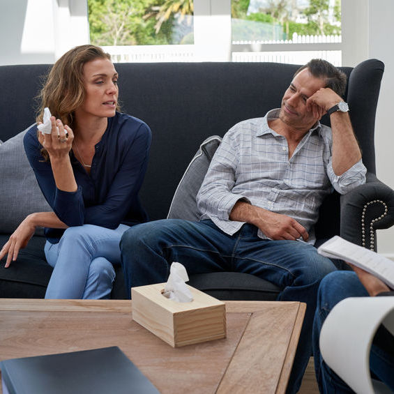 Caucasian couple receiving marriage counseling